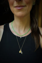 Load image into Gallery viewer, Magnesite Beads Strand with Gold Antler