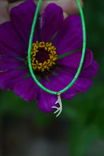 Load image into Gallery viewer, Magnesite Beads Strand with Gold Antler